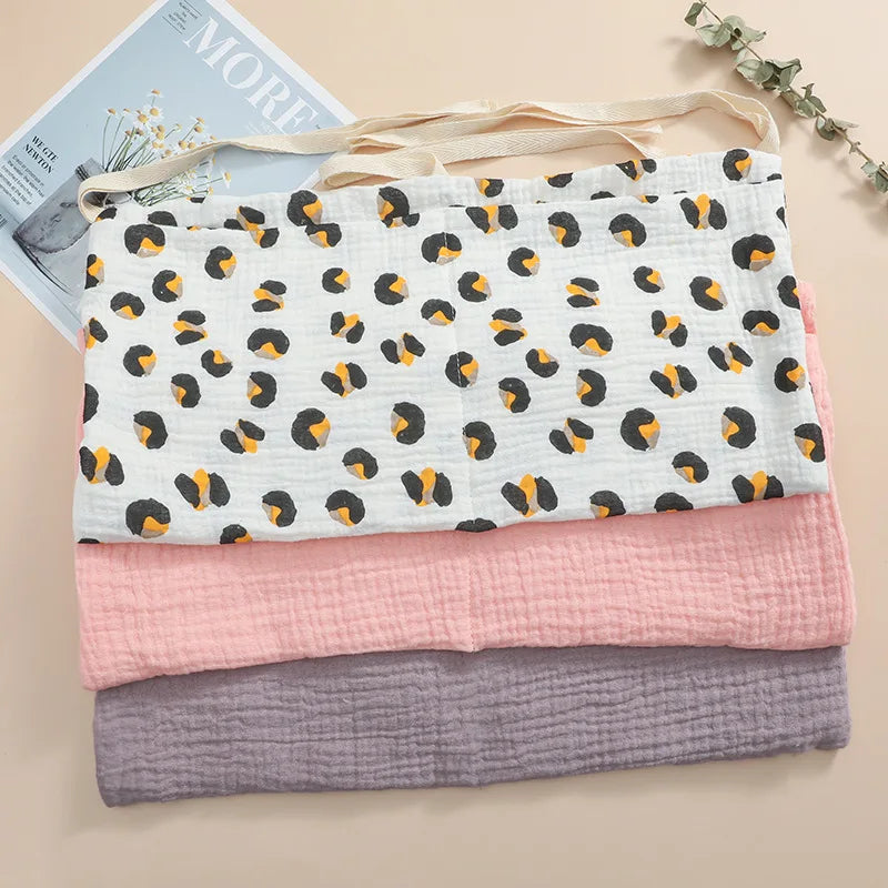 Organisateur de lit bébé multi-poches pour couches et accessoires