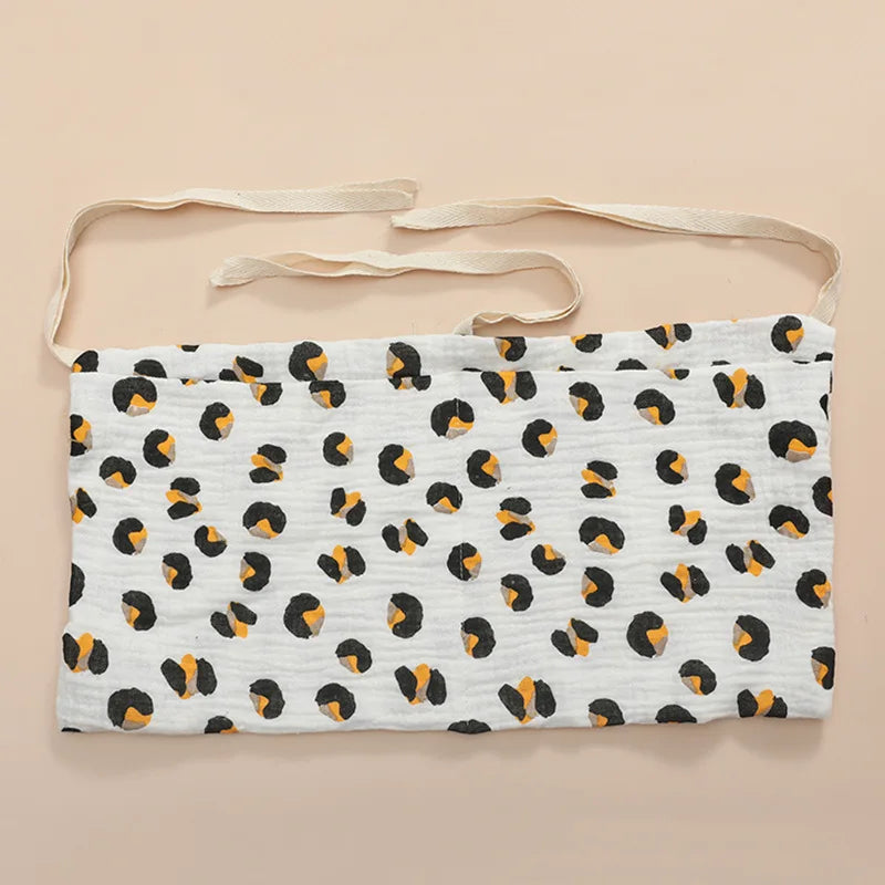 Organisateur de lit bébé multi-poches pour couches et accessoires