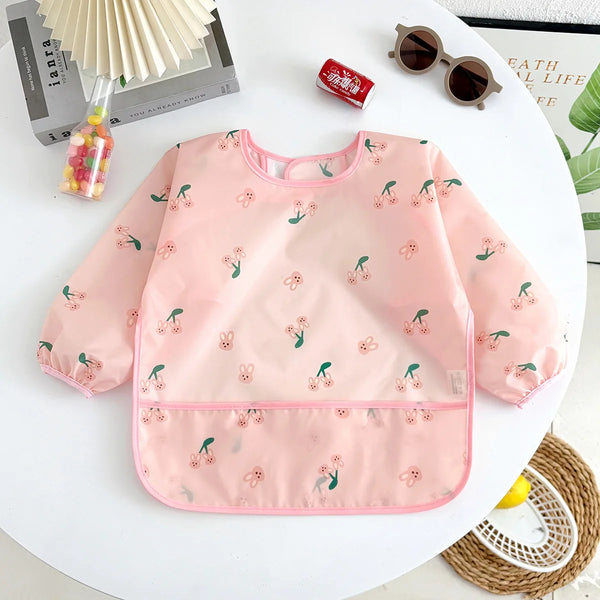 Bavoir imperméable à manches longues motif lapin rose | Mybooni