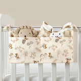 Organisateur de lit bébé multi-poches pour couches et accessoires