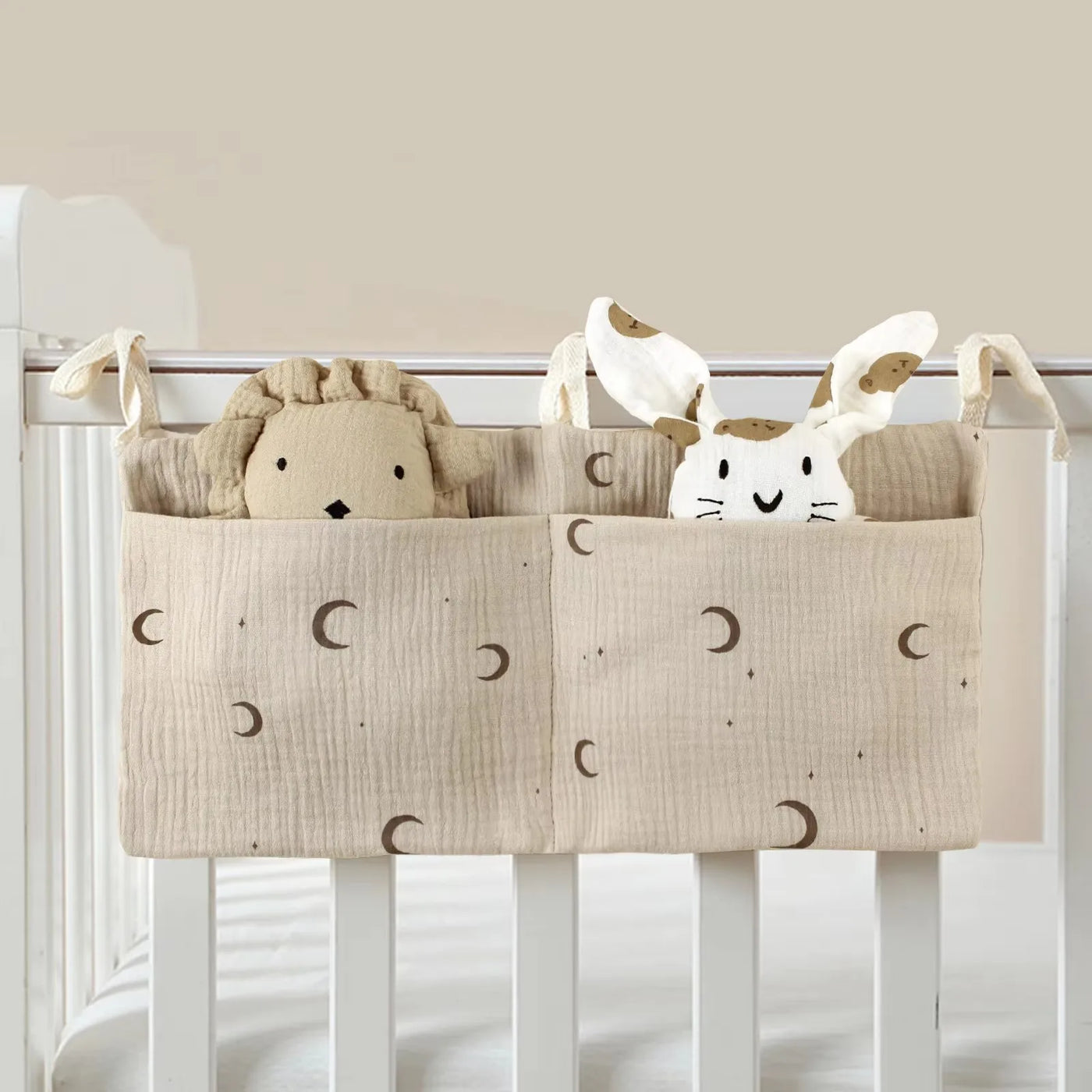 Organisateur de lit bébé multi-poches pour couches et accessoires