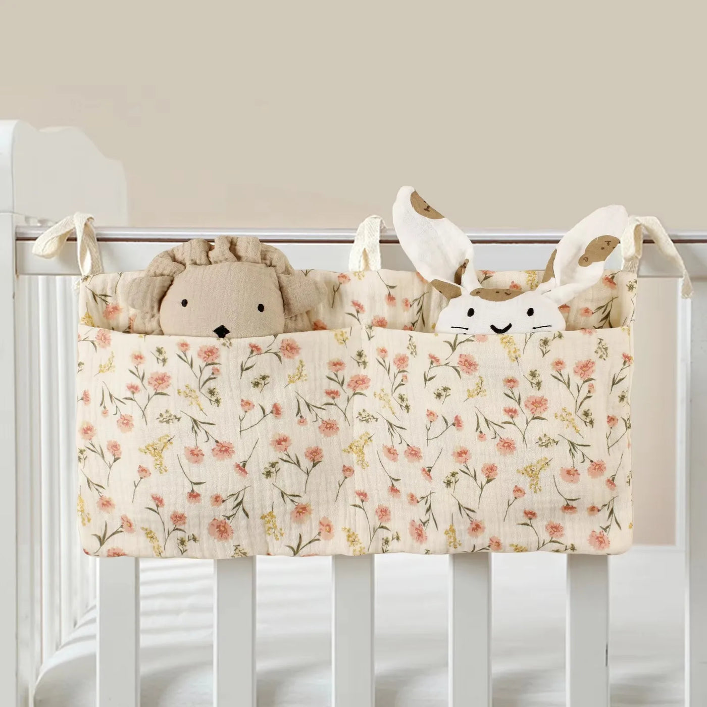 Organisateur de lit bébé multi-poches pour couches et accessoires