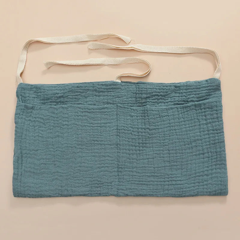 Organisateur de lit bébé multi-poches pour couches et accessoires