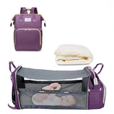 Sac à langer violet avec espace de change bébé
