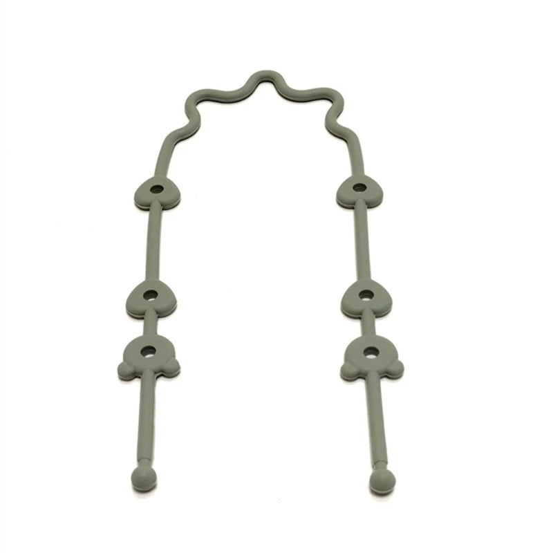 Attache-tétine silicone avec sangle de sécurité - accessoire poussette et chaise haute