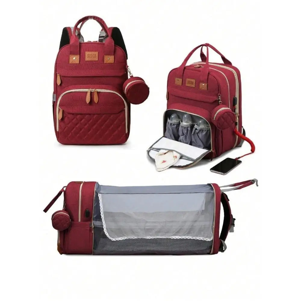 Sac à langer rouge avec lit pliant intégré
